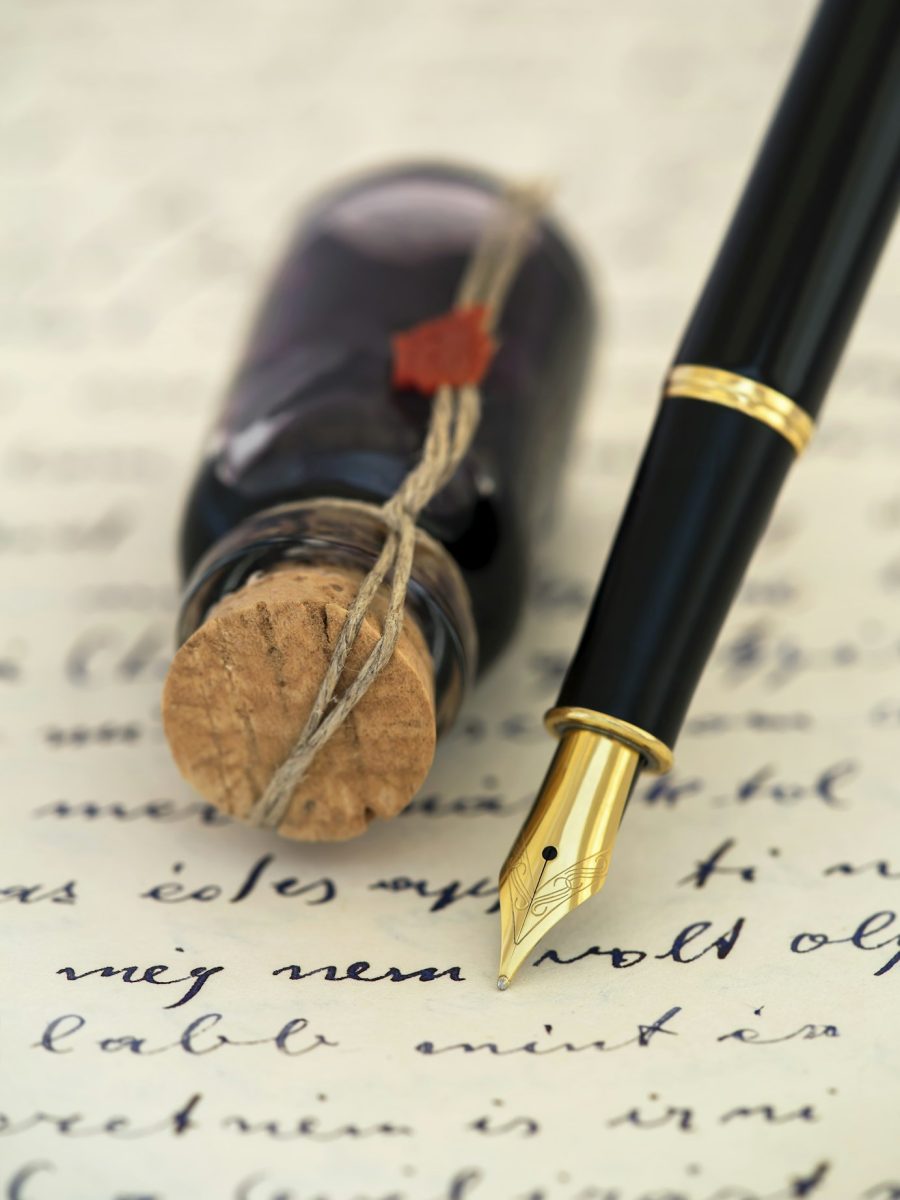Fountain pen on a handwritten letter